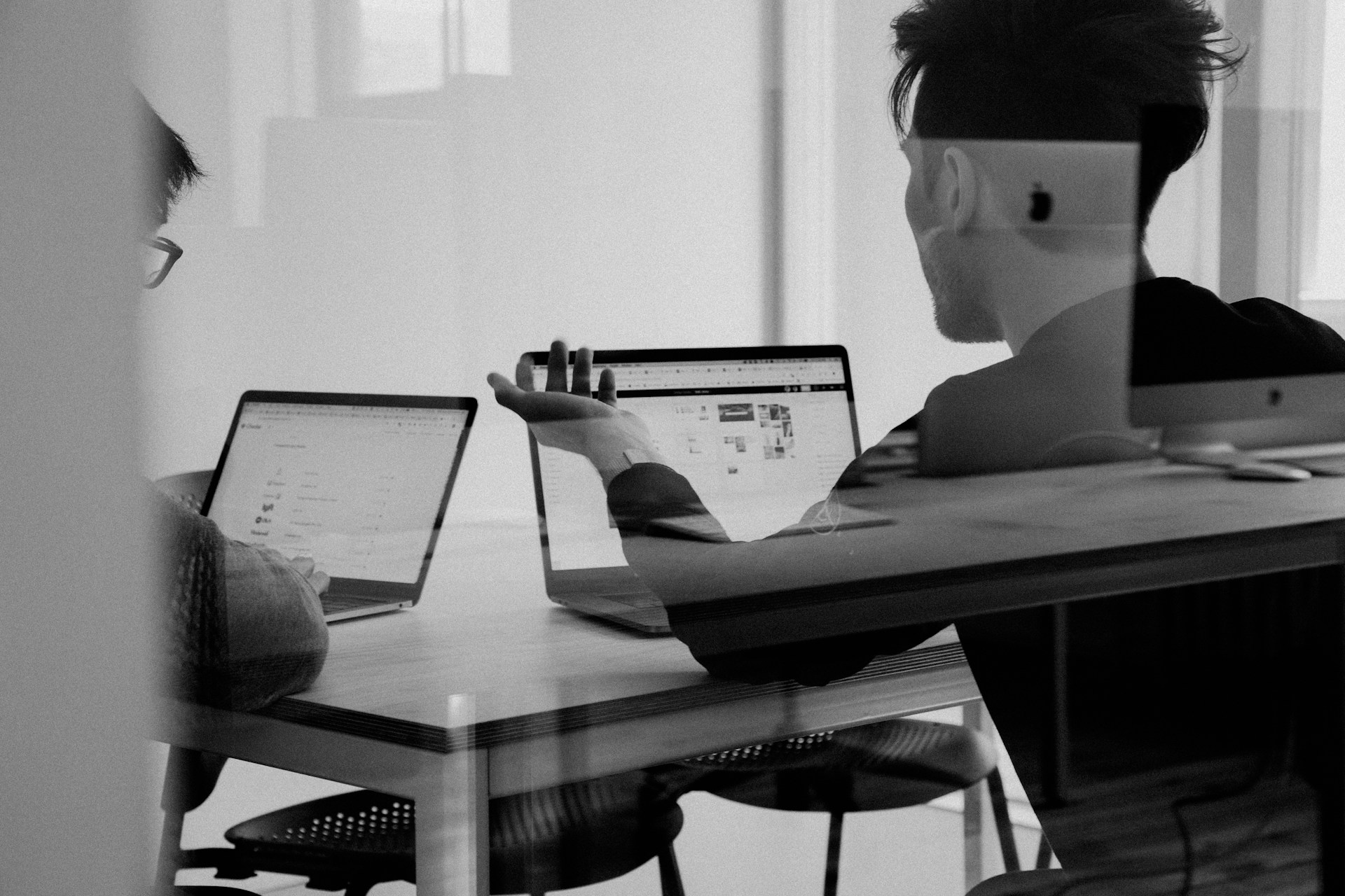 Campaign Matrix team mapping a brand-to-demand funnel on a whiteboard in the Singapore studio